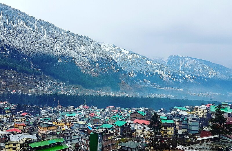 Charming streets of Old Manali, showcasing quaint cafes, traditional cottages, and a laid-back atmosphere perfect for relaxation